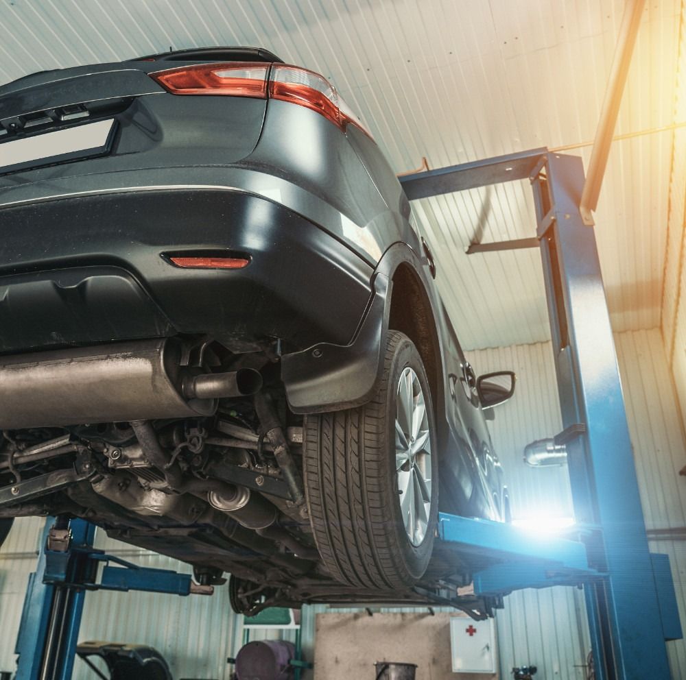Vehicle on an MOT Ramp for its annual inspection - Book Your MOT in Liverpool